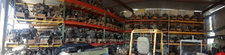 A packed warehouse of used auto parts.