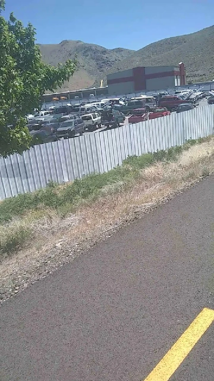 A parking lot filled with cars at Pick-n-Pull.