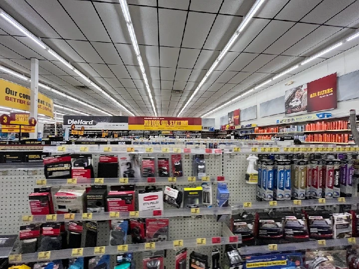 Aisles of auto parts in an Advance Auto Parts store.