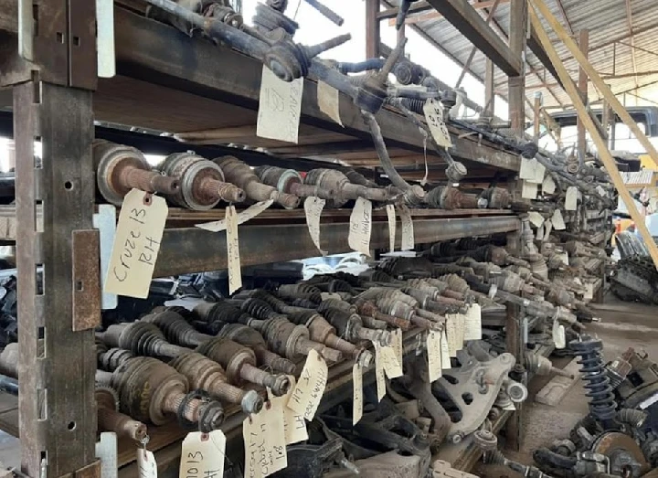 Auto parts on shelves at Junior's Auto Salvage.