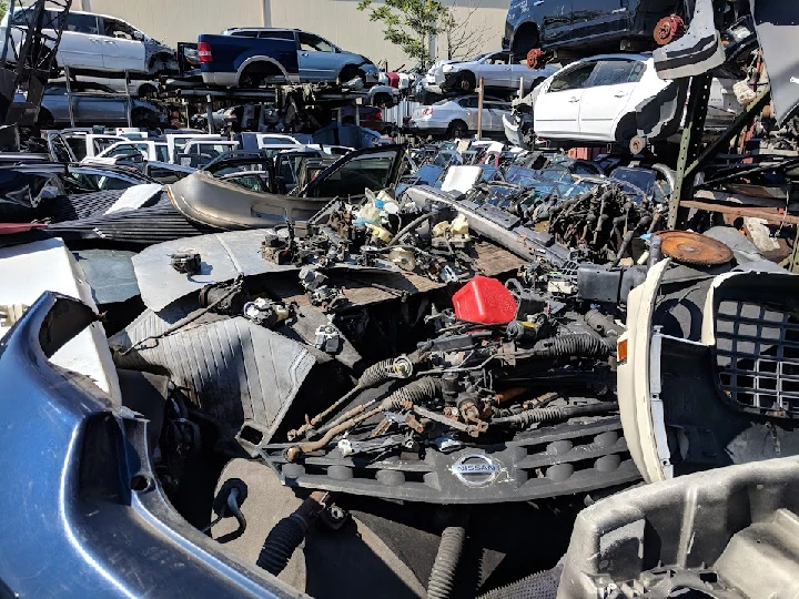 Auto parts and wrecked vehicles at J & J Auto Wreckers.