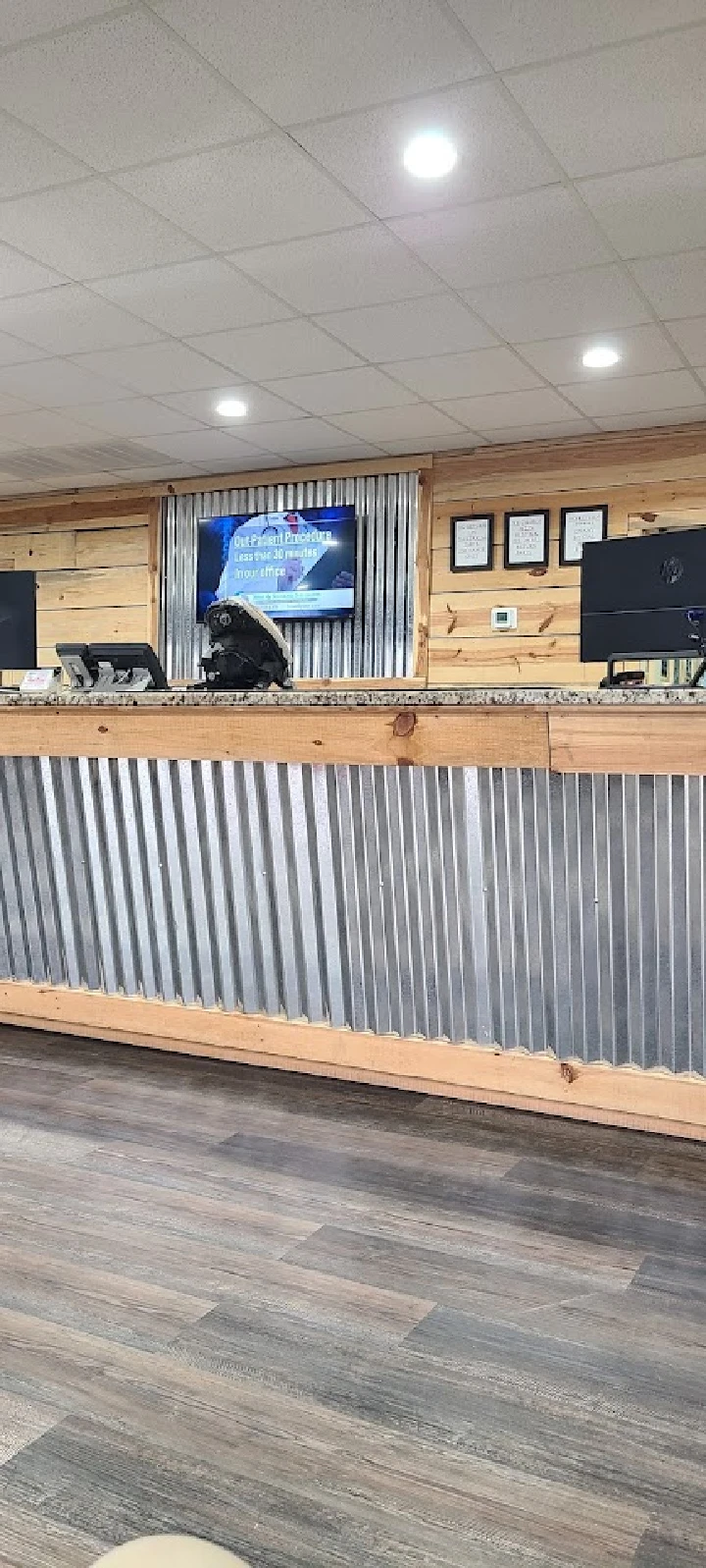 Auto salvage reception area with displays and decor.