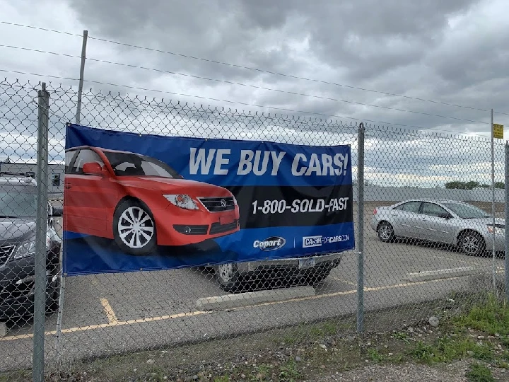 Banner promoting car buying services. 1-800-SOLD-FAST.