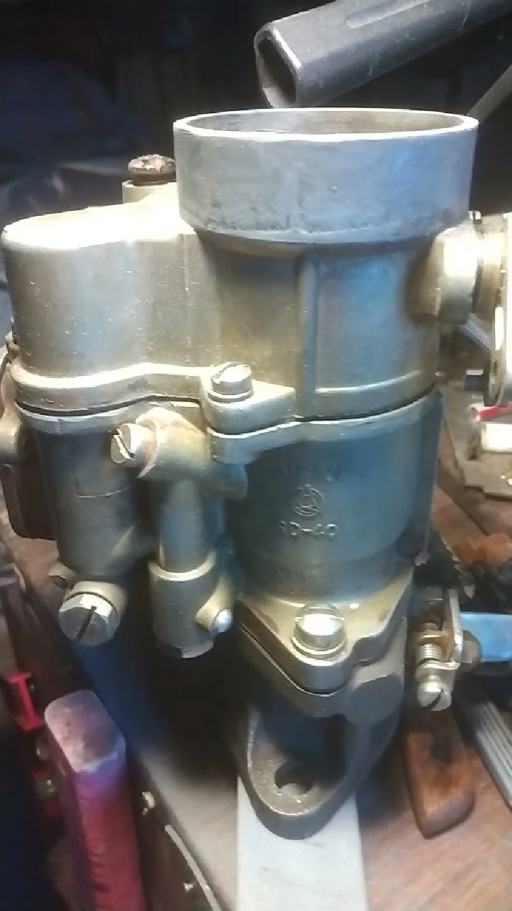 Carburetor on a workbench at U-Pull-&-Pay Albuquerque.