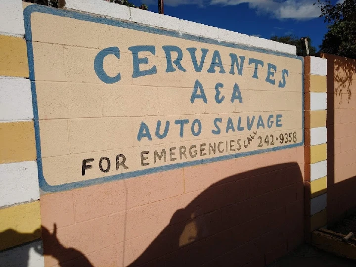 Cervantes A&A Auto Salvage sign with contact info.