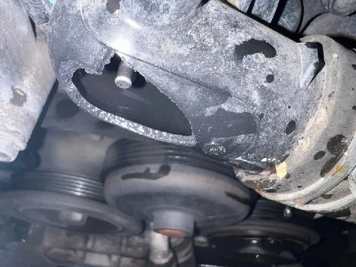 Close-up of a damaged automotive part.