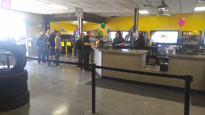 Customers queue at the Pick-n-Pull service counter.