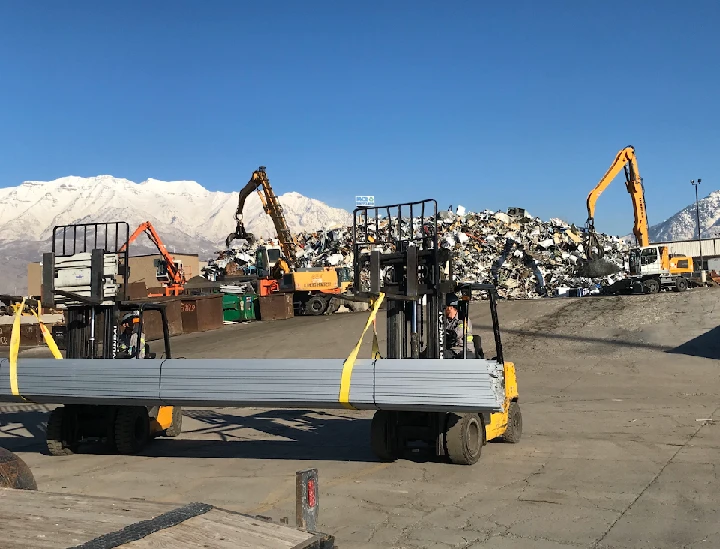 Forklifts and machinery at MCR Recycling site.