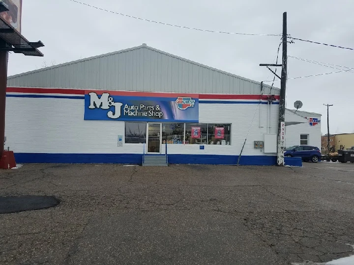 M and J Auto Parts store exterior view.