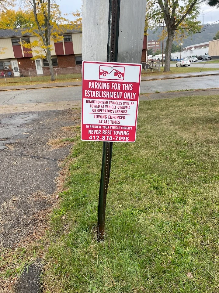 Parking sign for authorized vehicles only.