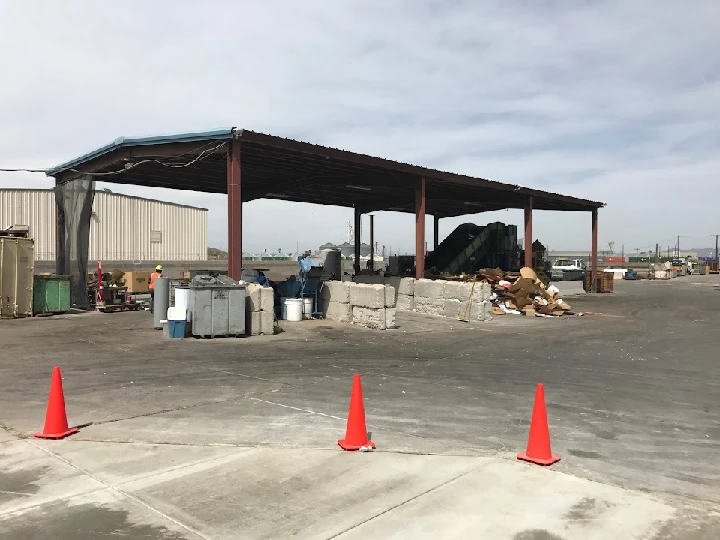 Recycling facility with materials and processing area.