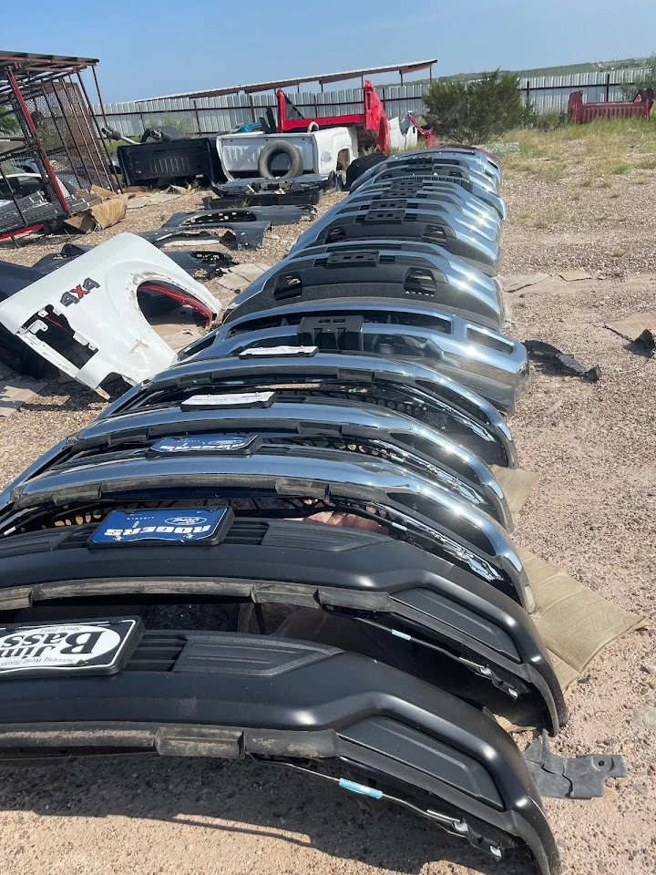 Rows of used auto parts bumpers at Roca.