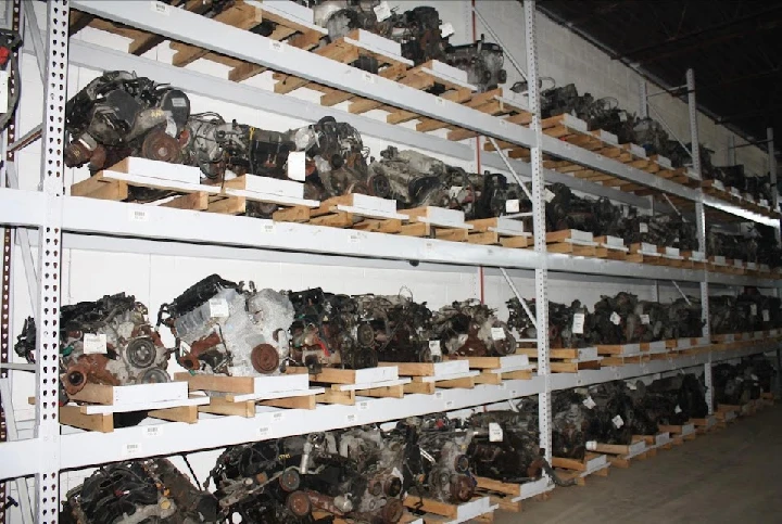 Shelves of used engines at Allgeier Auto Parts Inc.