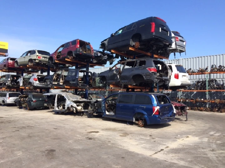 Stacked junk cars at Newark Motor & Export Corp.