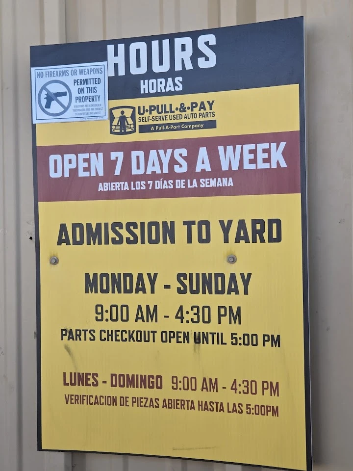 U-Pull-&-Pay hours and admission details sign.