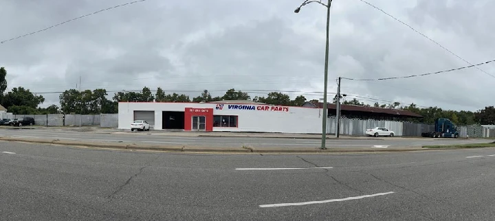 Virginia Car Parts storefront on a cloudy day.