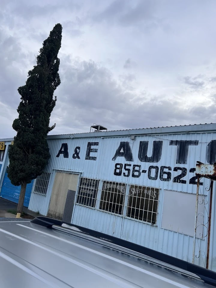 A&E Auto building exterior with cloudy sky.