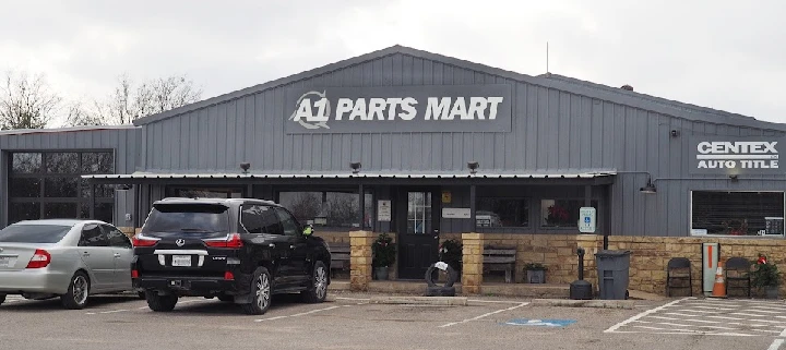 A1 Parts Mart storefront with parked cars.