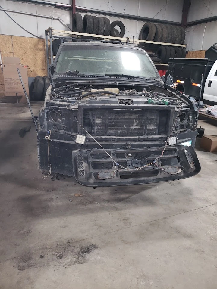 Abandoned vehicle in auto parts shop.