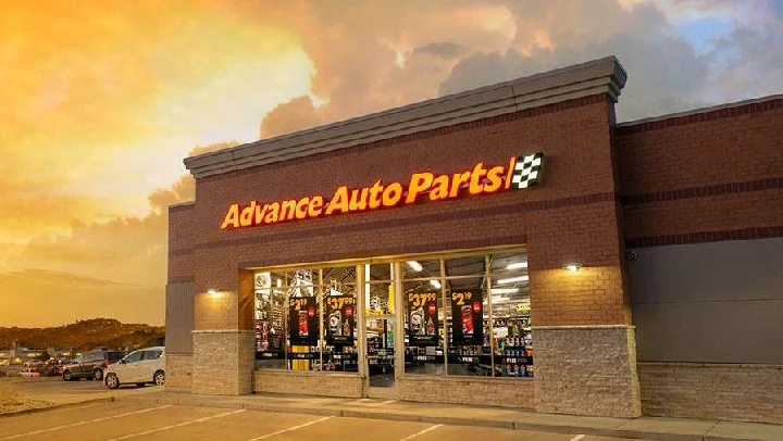 Advance Auto Parts store exterior at sunset.