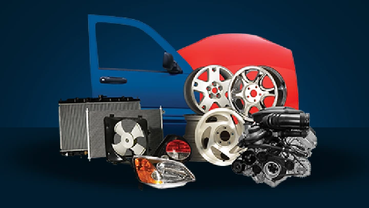 Auto parts and components arranged in front of a vehicle.