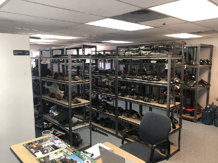 Auto parts shelves in Arizona Auto Group's workshop.