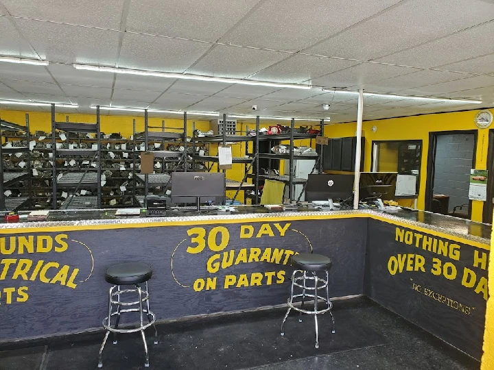 Auto parts store interior with service counter.