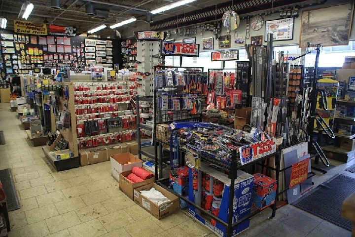 Auto parts store interior with various tools and supplies.