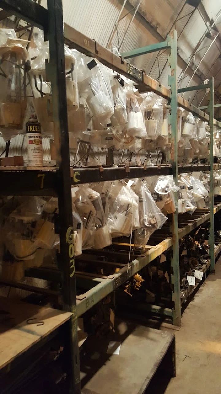 Auto parts stored on a warehouse shelf.