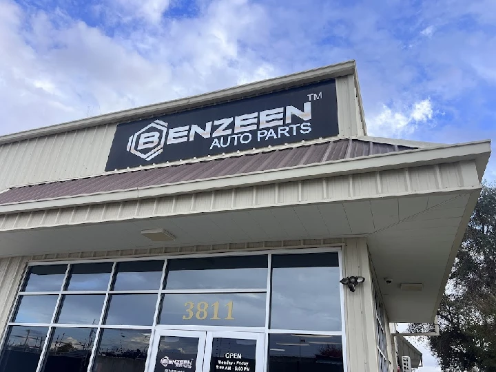 Benzeen Auto Parts storefront with logo and hours.