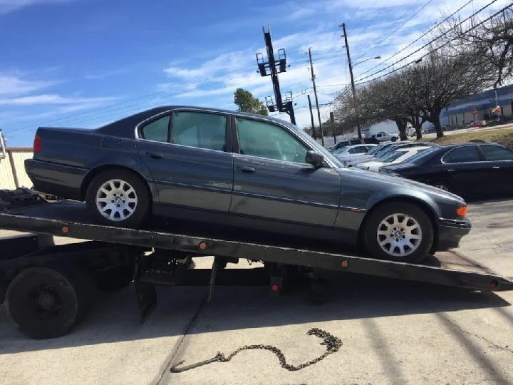 Car being loaded onto a tow truck in Atlanta.