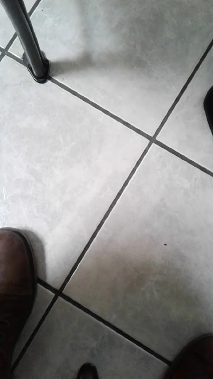 Footwear on tiled floor at RAMCON Services.