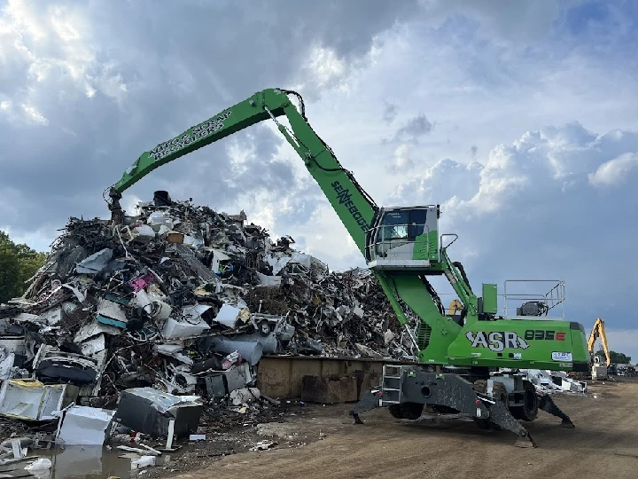 Heavy machinery at a scrap recycling facility.