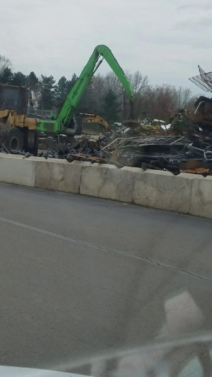 Heavy machinery at a scrapyard site.