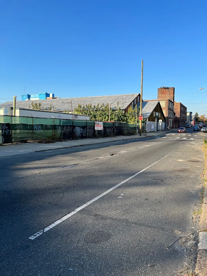 K & A Auto Salvage Inc building on a sunny street.