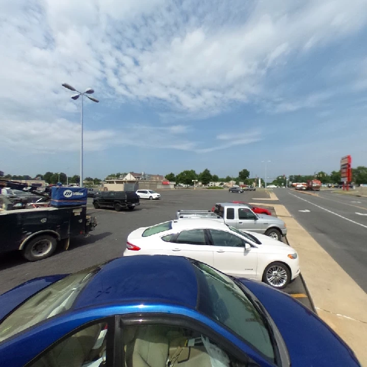 Parking lot view near Advance Auto Parts store.