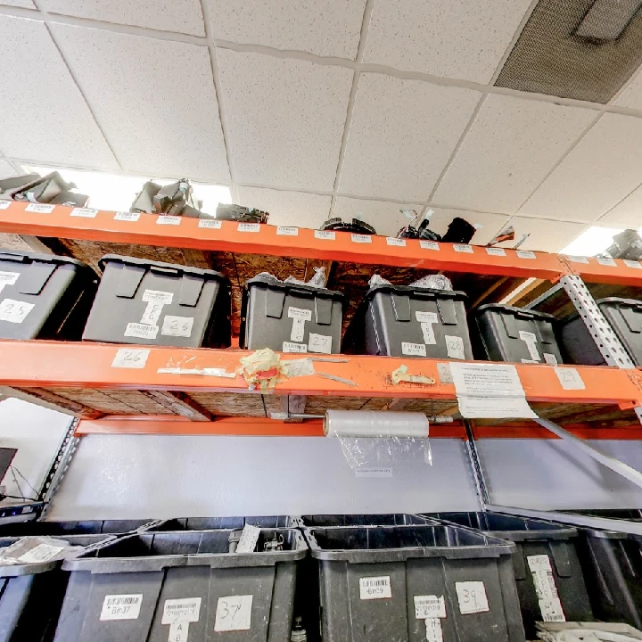 Parts bins on shelves at AH Parts Dismantlers.