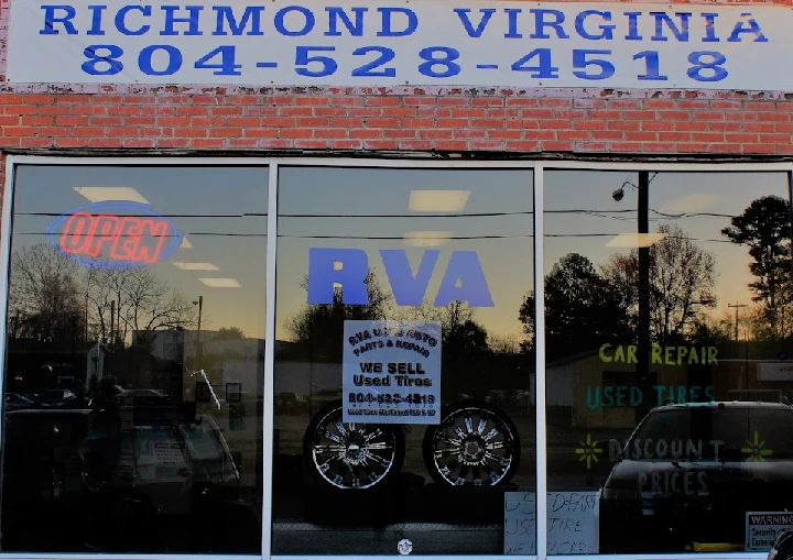 RVA Used Auto Parts storefront with open sign.