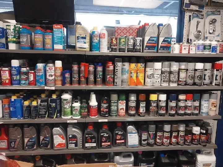 Shelves stocked with automotive fluids and supplies.