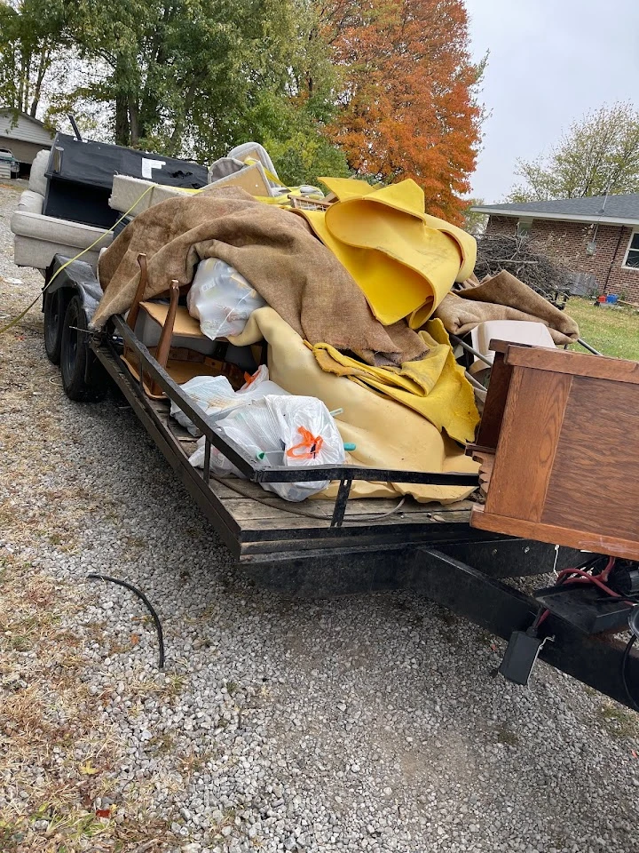 Trailer filled with junk for removal.