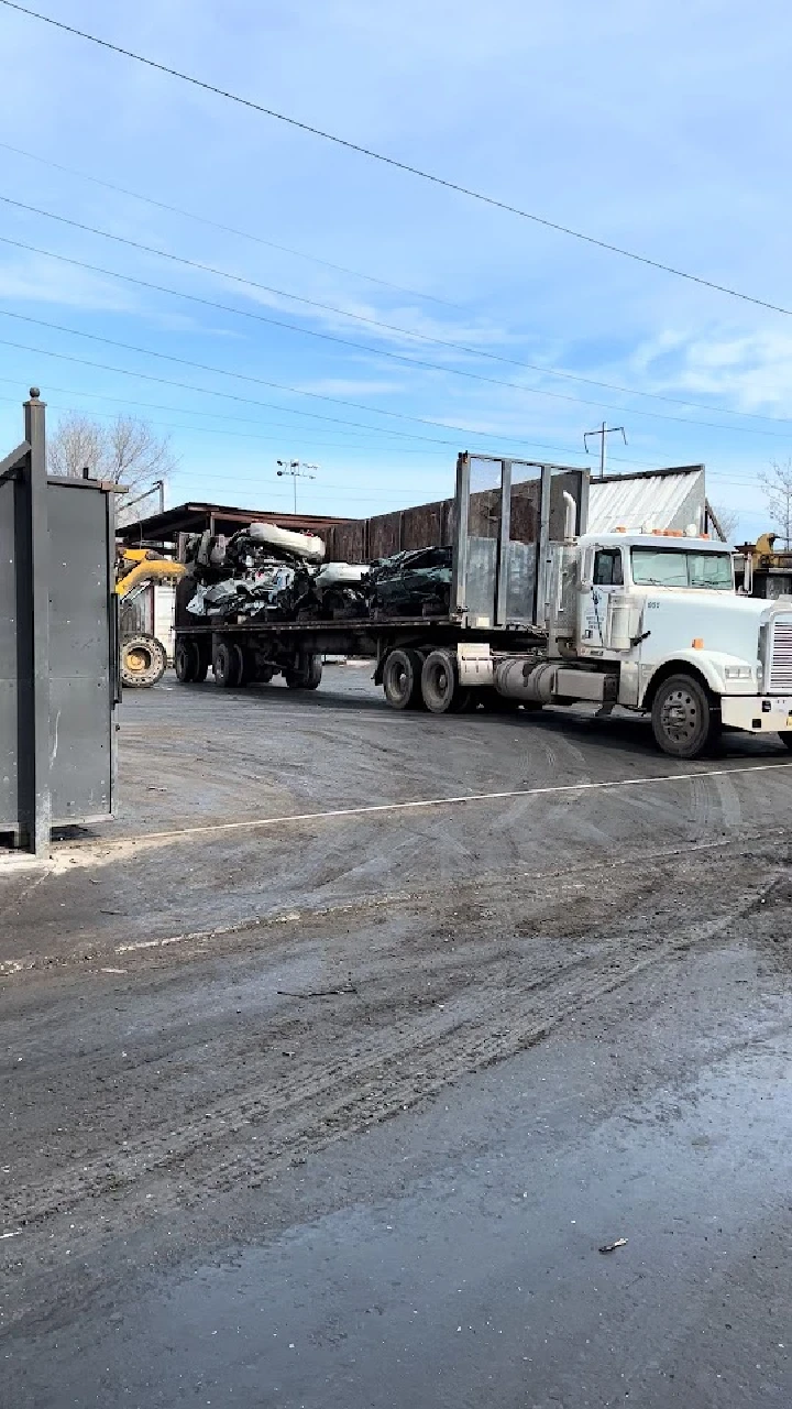 Truck loading scrap at KAARS Inc. facility.