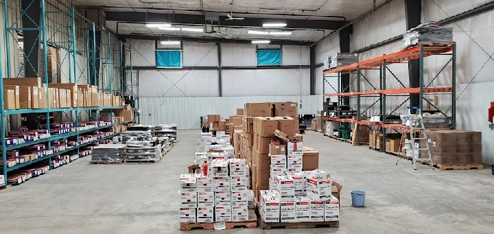 Warehouse filled with automotive parts and supplies.