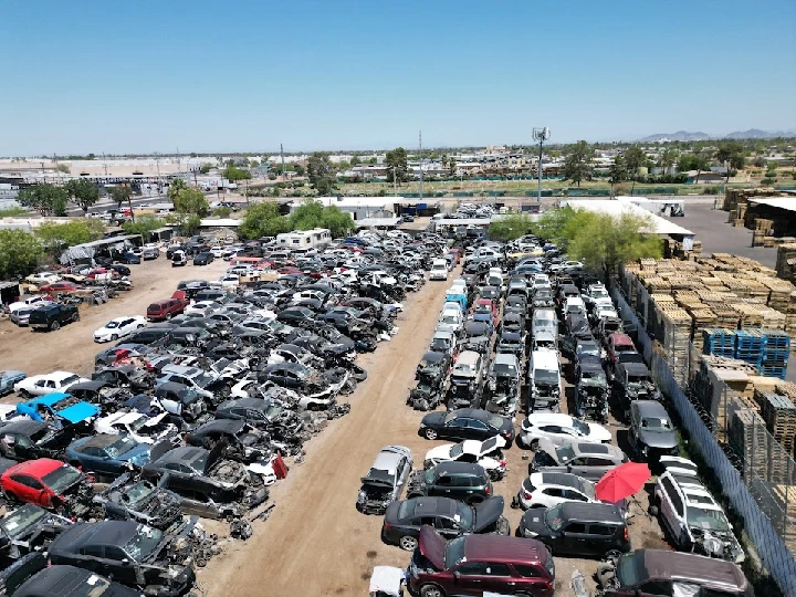 Aerial view of a large auto wrecking yard.