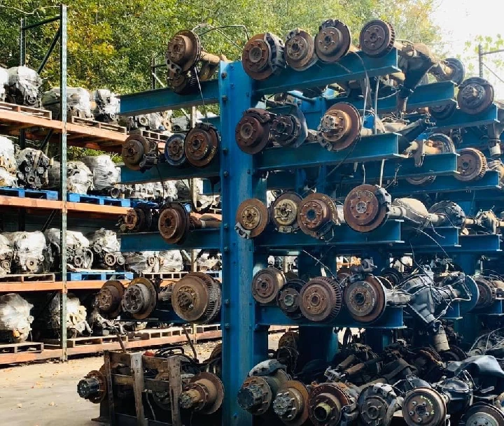 Auto parts stacked on shelves at Sam's Auto Salvage.