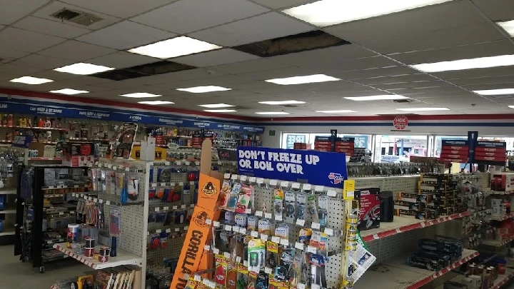 Auto parts store interior filled with products.