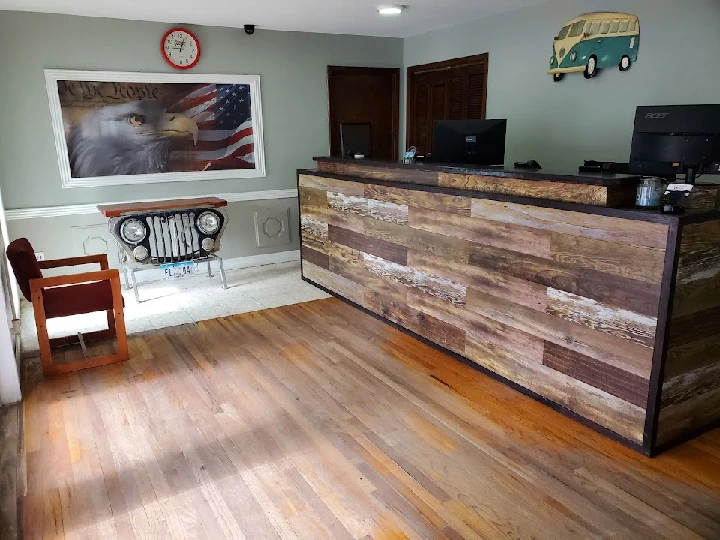 Auto Salvage Depot reception area with rustic decor.