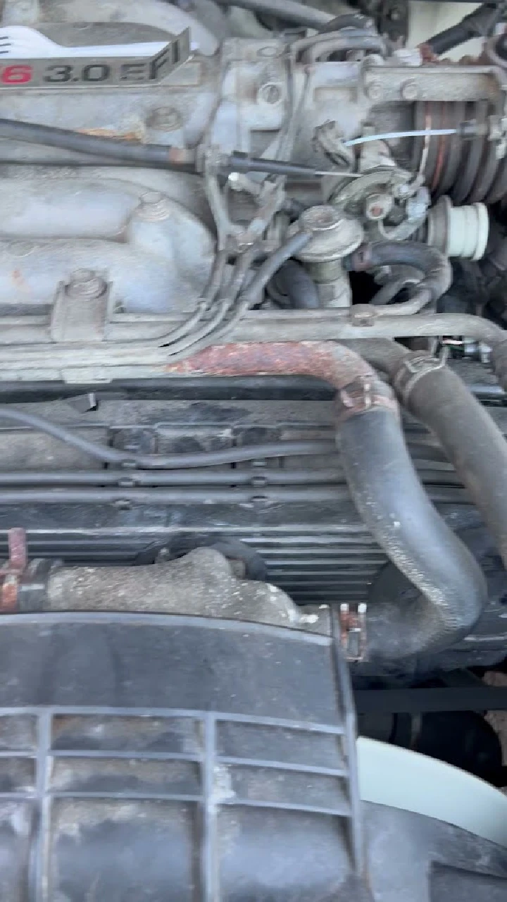 Engine components displayed at A-Best Auto Wrecking.