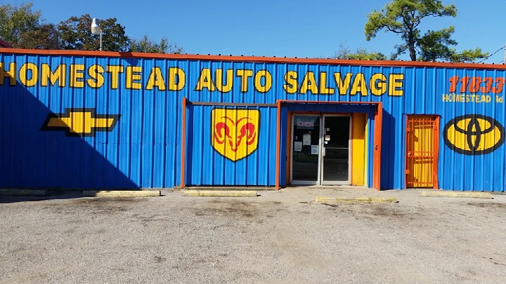 Homestead Auto Salvage building with signage.