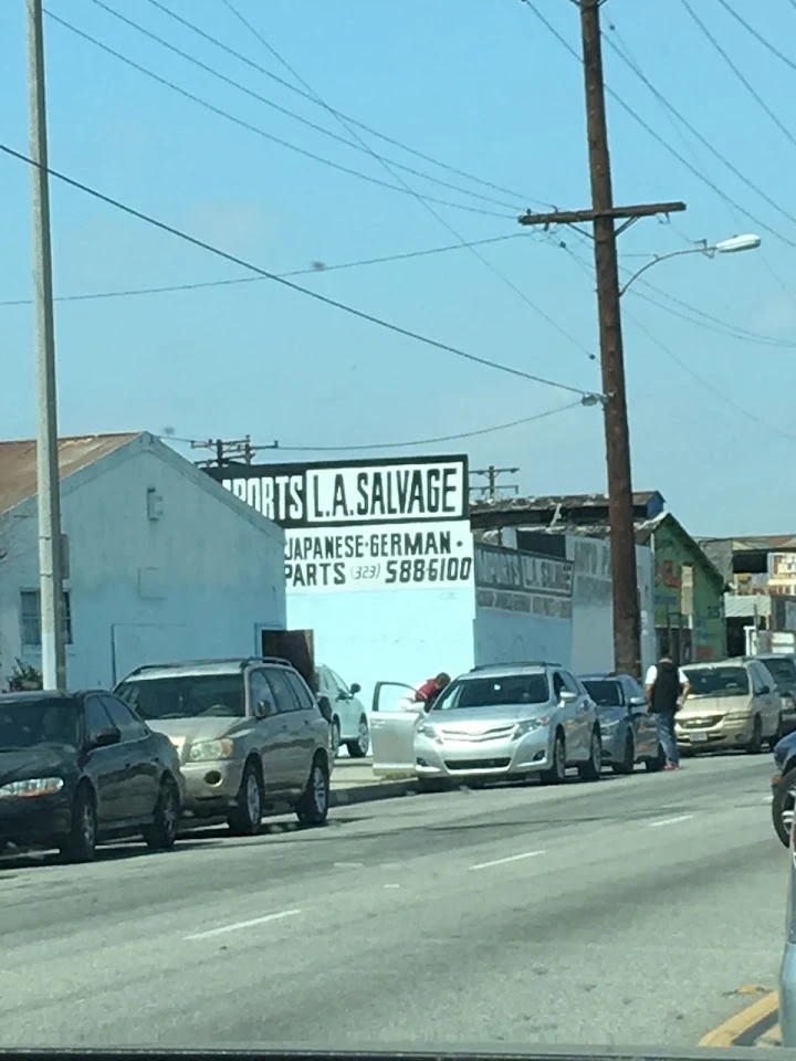 Imports L.A. Salvage storefront and parked cars.