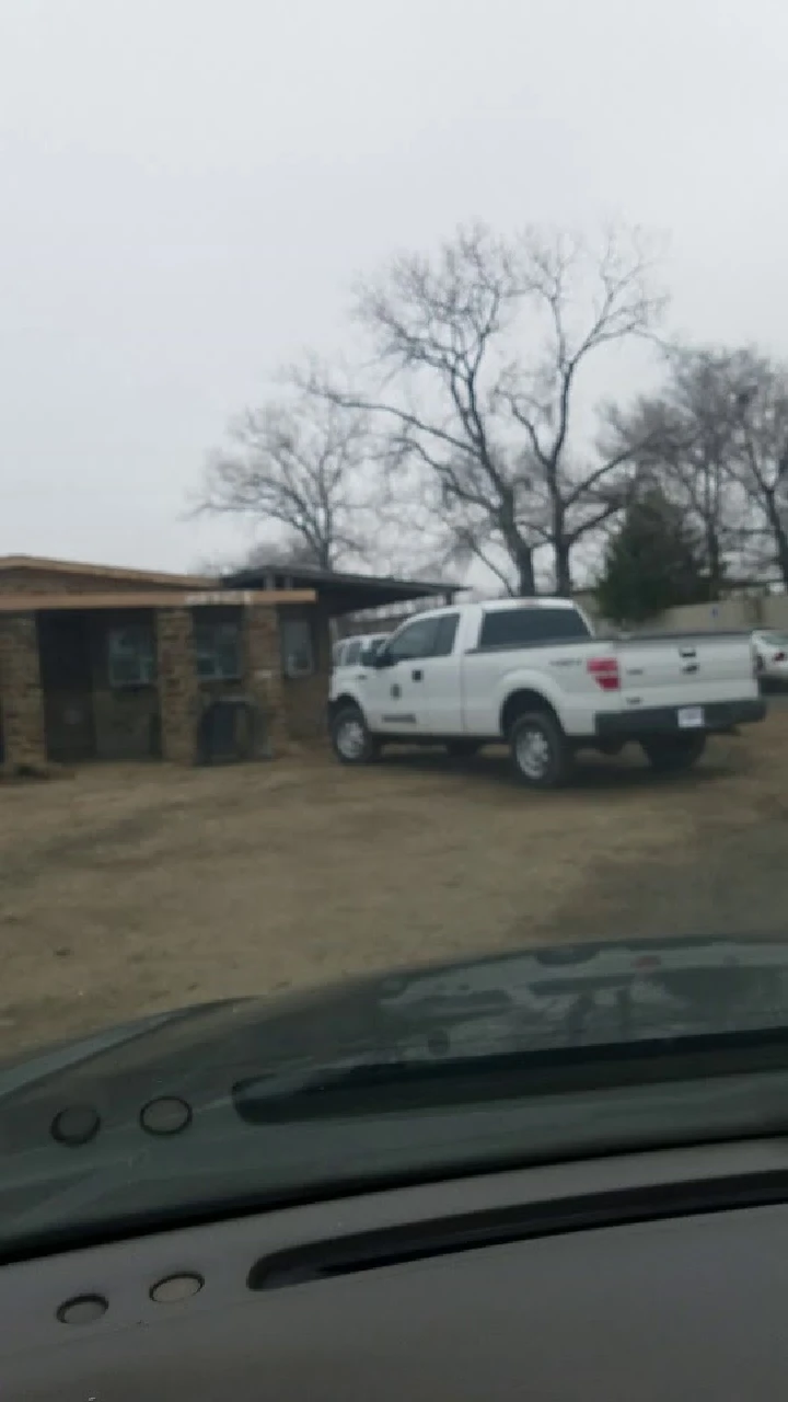 Lane Recyclers location with parked white truck.